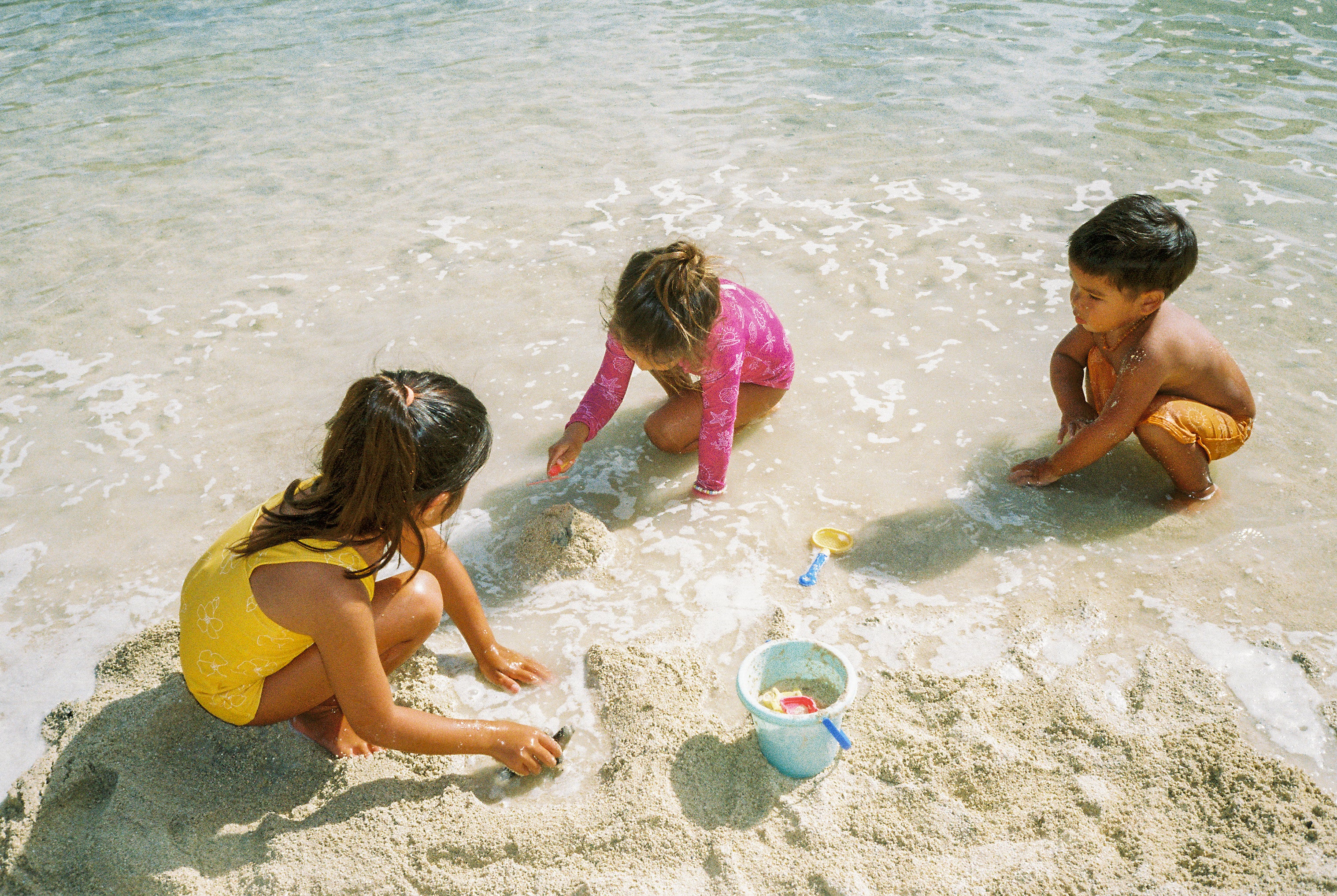 children playing in the sand